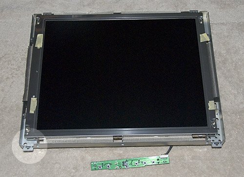 Figure 5 – LCD removed from the Case (Note: corner bracket – lower left)