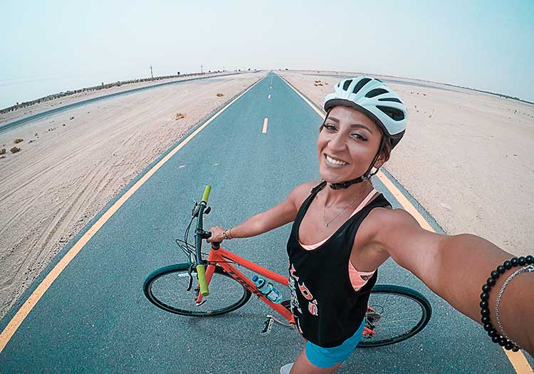 A cyclist is making selfie