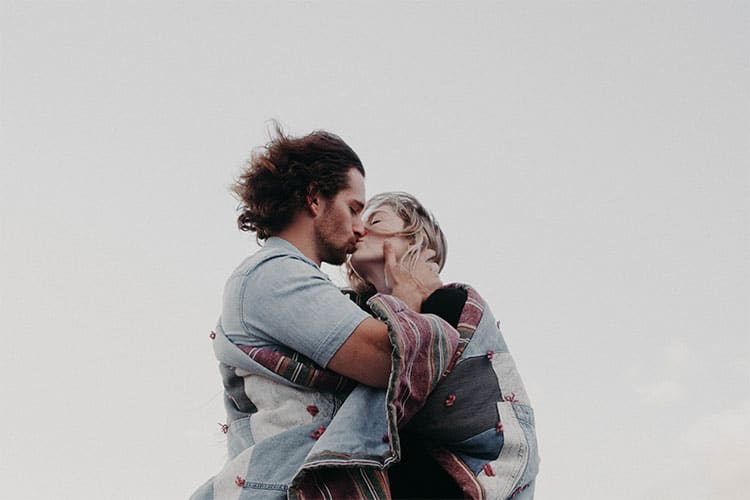 Beautiful young couple kissing and posing the camera, Stock Photo, Picture  And Low Budget Royalty Free Image. Pic. ESY-055228904 | agefotostock